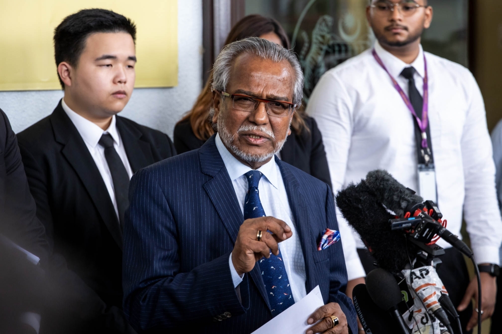 Lawyer Tan Sri Muhammad Shafee Abdullah speaks during a press conference at the Kuala Lumpur Court Complex February 7, 2024. — Picture by Firdaus Latif