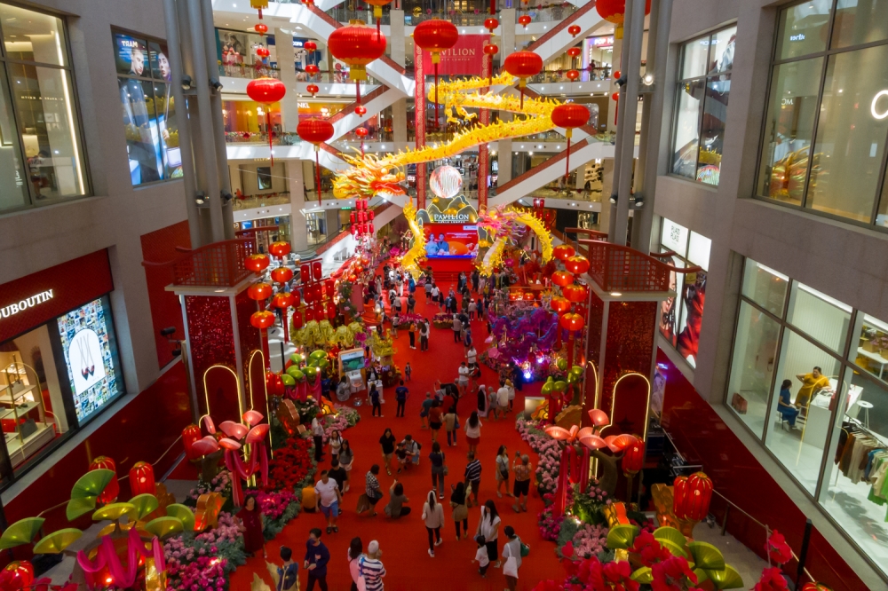 The double dragon sculpture at the centre court of Pavilion Kuala Lumpur, Bukit Bintang proved to be one of the most challenging parts of their Chinese New Year decoration. — Picture by Raymond Manuel