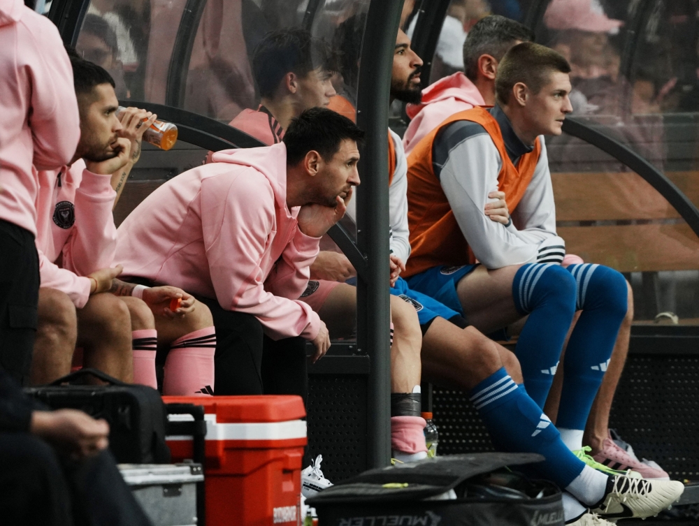 Inter Miami's Lionel Messi looks on from the substitutes bench. — Reuters pic