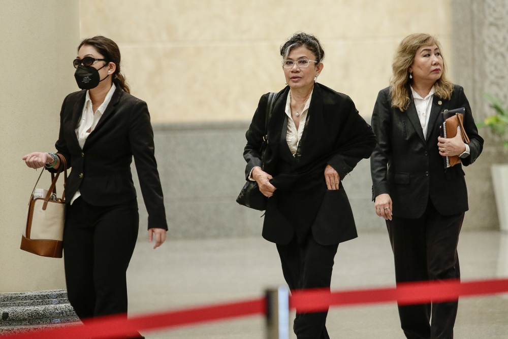 Nik Elin Zurina Nik Abdul Rashid (centre), a native of Kelantan, along with her daughter Tengku Yasmin Nastasha Abdul Rahman, filed a petition directly with the Federal Court under Article 4(4) of the Federal Constitution, naming the Kelantan government as the sole respondent in this case. — Picture by Yusof Mat Isa