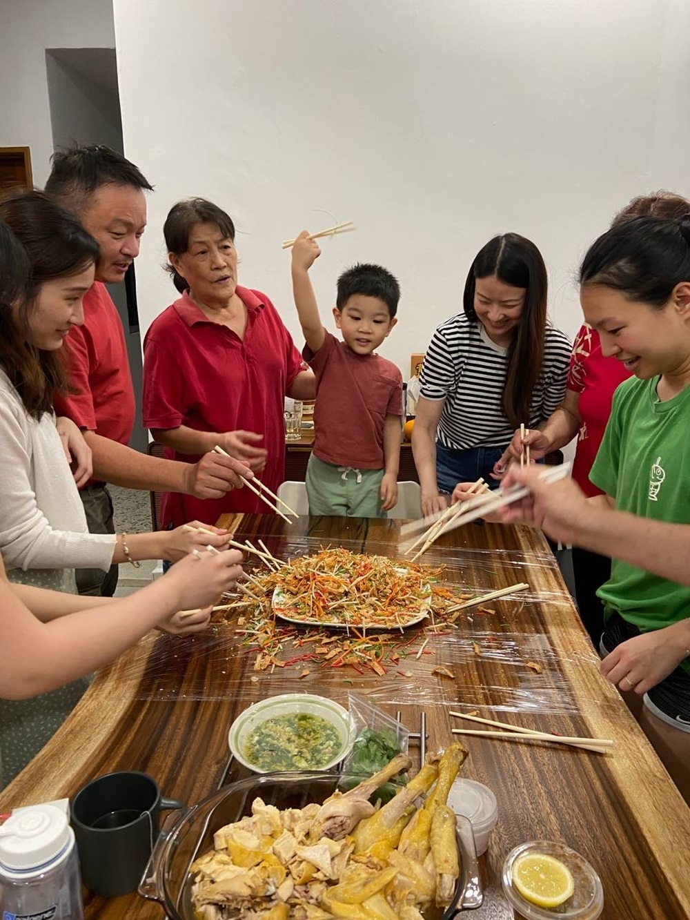 Low Sze Chia’s extended family will be tossing their home made ‘yee sang’ in Klang again this year for better health and wealth to curb the spread of viral diseases and reduce spending with restaurant prices rising. — Picture courtesy of Low Sze Chia