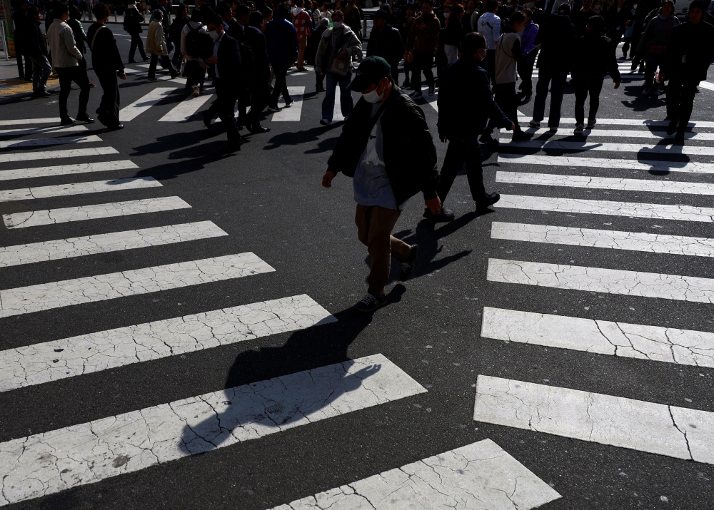 The economic pain comes as Japan’s stock market is enjoying a surge thanks to improved governance at major corporations and a weaker yen fattening profits for the likes of Toyota and other manufacturers. — Reuters pic