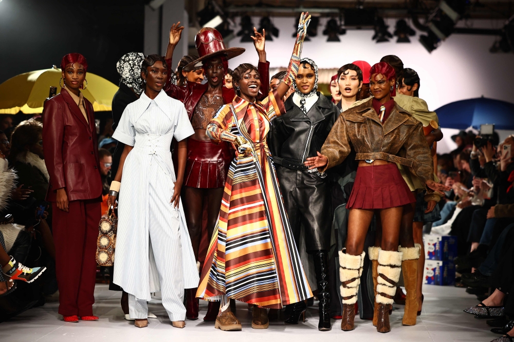 Models present creations by British-Nigerian designer Tolu Coker during a catwalk presentation for her Autumn/Winter 2024 collection during London Fashion Week in London, on February 16, 2024. — AFP pic