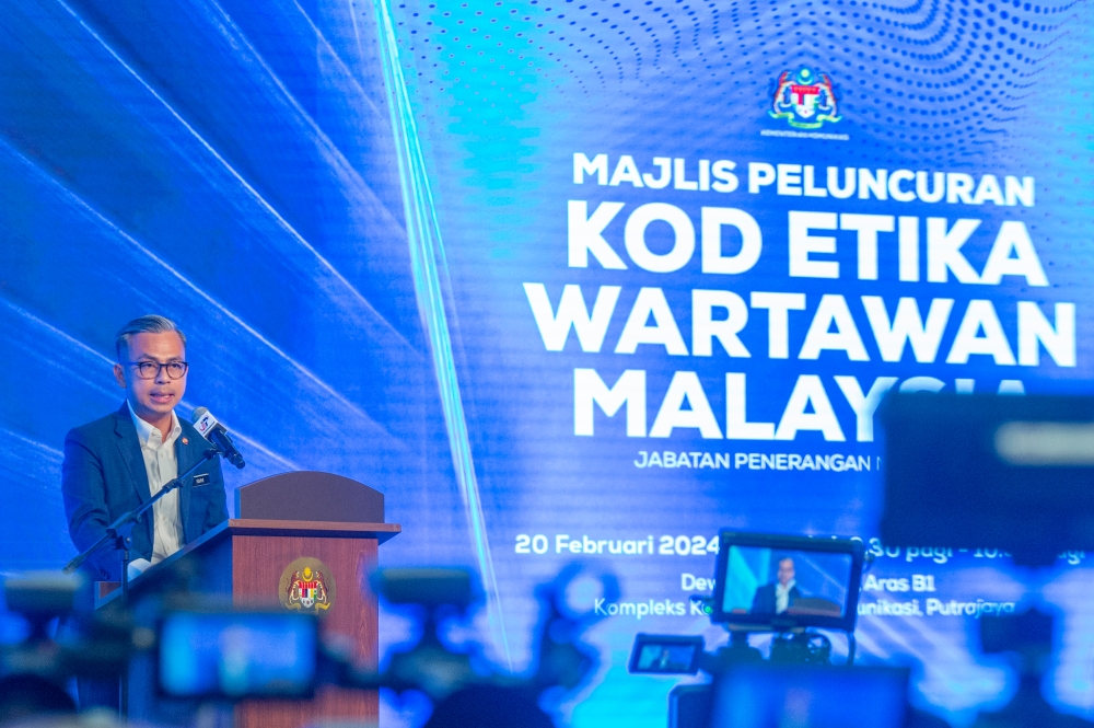 Communications Minister Fahmi Fadzil speaks during the launch of the Malaysian Code of Ethics for Journalists at Communications Ministry in Putrajaya February 20, 2024. ― Picture by Shafwan Zaidon