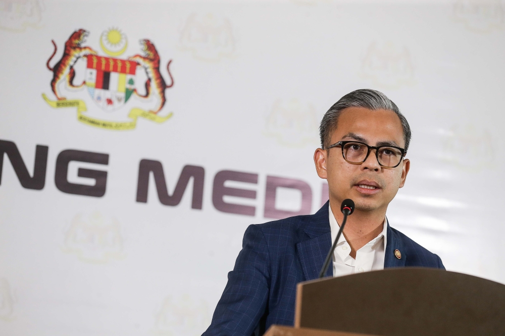 Minister of Communication Fahmi Fadzil said the ministry is looking for the best solution to protect part-time media practitioners, film and music crew, and behind-the-scene production teams. — Picture by Sayuti Zainudin