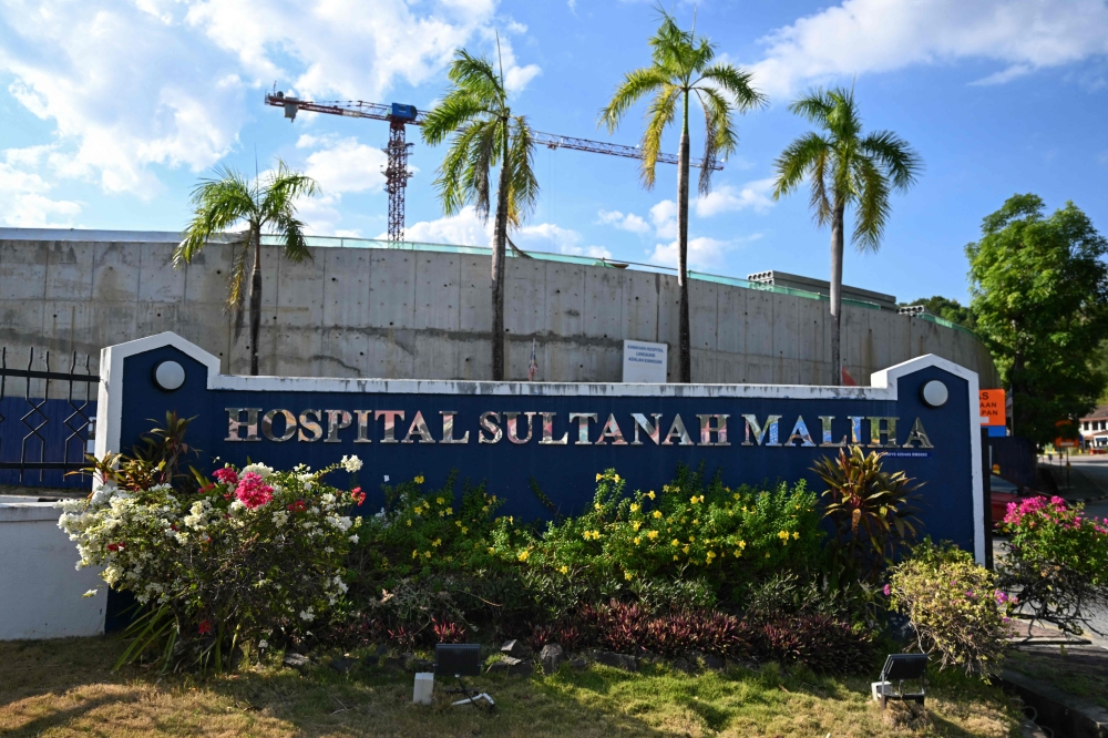The sign for Sultanah Maliha Hospital, where Norway's King Harald has been admitted with an infection, is pictured near the entrance of the facility on the Malaysian resort island of Langkawi on February 28, 2024. Norway's King Harald, aged 87 and in poor health, was hospitalised with an infection while on holiday in Malaysia, the Royal House of Norway said on February 27. — AFP pic 