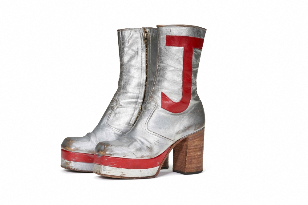 This handout picture provided by Christie's New York on January 11, 2024 shows a pair of silver leather tall platform boots, circa 1971, part of a selection of fashion pieces from Elton John's dazzling stage wardrobe. — AFP pic/Christie's