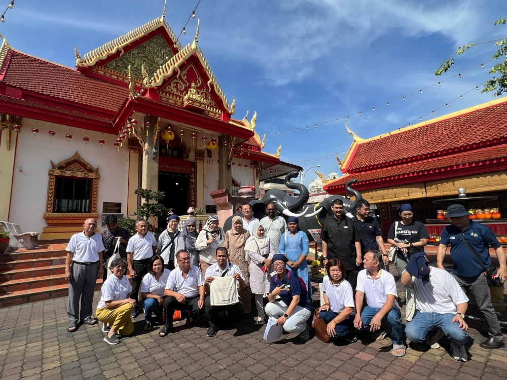 Participants of the Seberang Jaya Harmony Exploration at the Ku Cheng Tse Temple. — Picture by Opalyn Mok