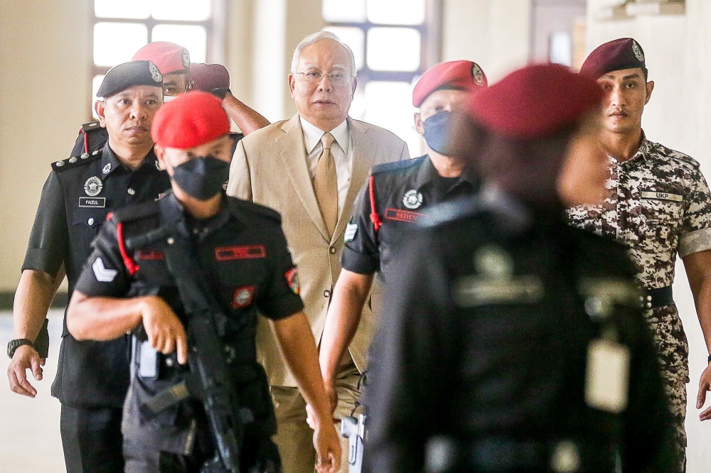 Former prime minister Datuk Seri Najib Razak (centre) at the High Court in Kuala Lumpur March 5, 2024. — Picture by Sayuti Zainudin