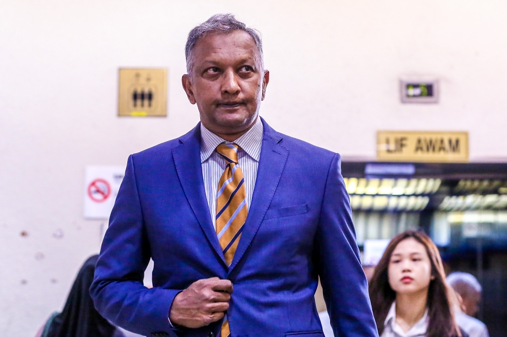 Former Singapore-based banker Kevin Michael Swampillai is pictured at the Kuala Lumpur High Court Complex March 6, 2024. — Picture by Yusof Mat Isa