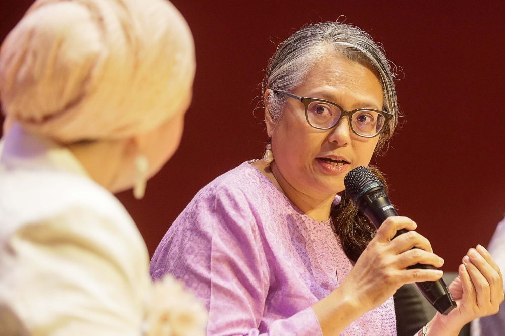 Sisters in Islam executive director Rozana Isa speaks during the 2024 International Women`s Day Forum at the Asia School Of Business March 7, 2024. — Picture by Sayuti Zainudin 