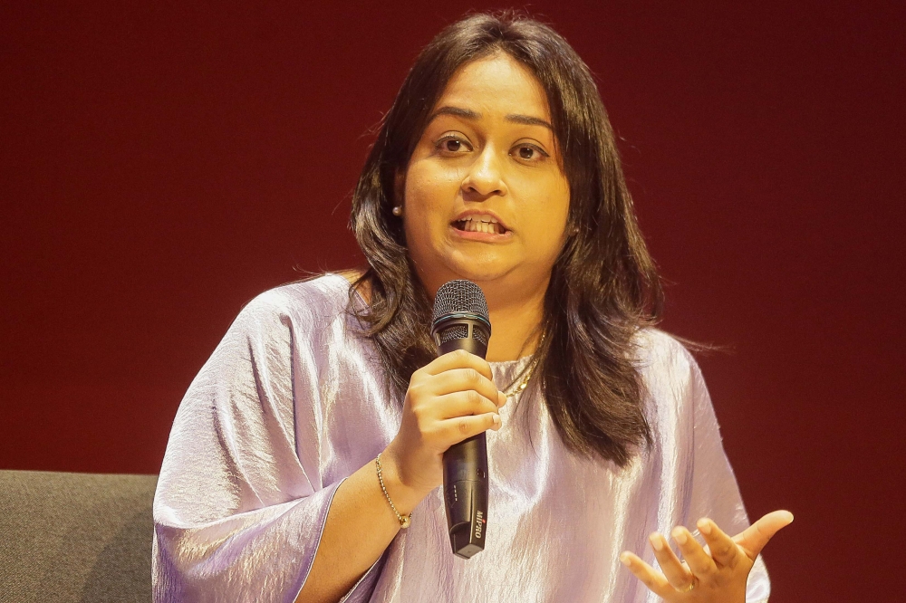 Development of Human Resources for Rural Areas (DHRRA) social protection director Maalini Ramalo speaks during the 2024 International Women`s Day Forum at the Asia School Of Business March 7, 2024. — Picture by Sayuti Zainudin 