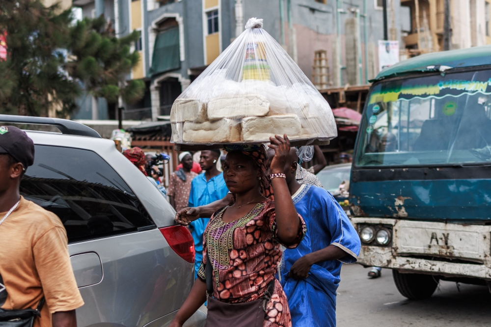 A vendor sells bread at the Lagos island market in Lagos on March 8, 2024, ahead of the holy fasting month of Ramadan. — AFP pic 