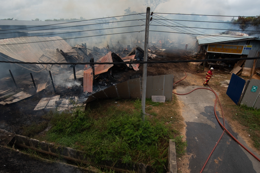 A view of the fire at Seng Seng Woodwork Co in Labuan March 16, 2024. — Bernama pic