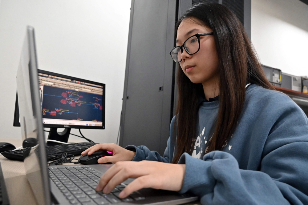 Photo taken on March 1, 2024 shows Nguyen Phuong Linh, a student at Hanoi University of Science and Technology, studying integrated circuit design in a classroom in Hanoi. — AFP pic 