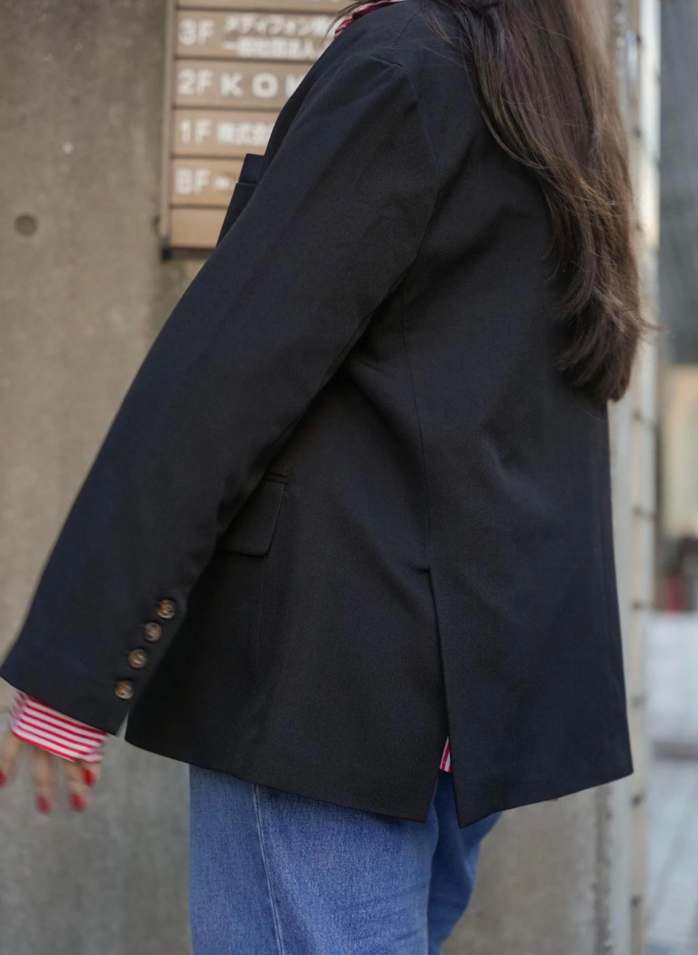 The relaxed-fit blazer comes in black.  — Picture courtesy of Petit Moi