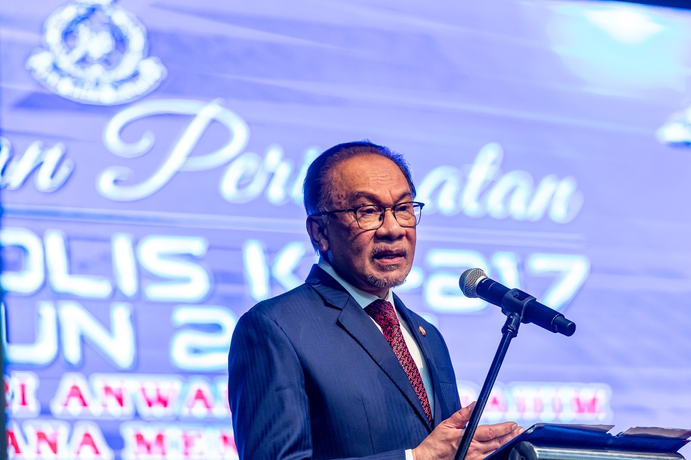 Prime Minister Datuk Seri Anwar Ibrahim speaks during the 217th Police Day Commemoration Celebration 2024 at Police Training Centre (Pulapol) in Kuala Lumpur March 25, 2024. — Picture by Firdaus Latif