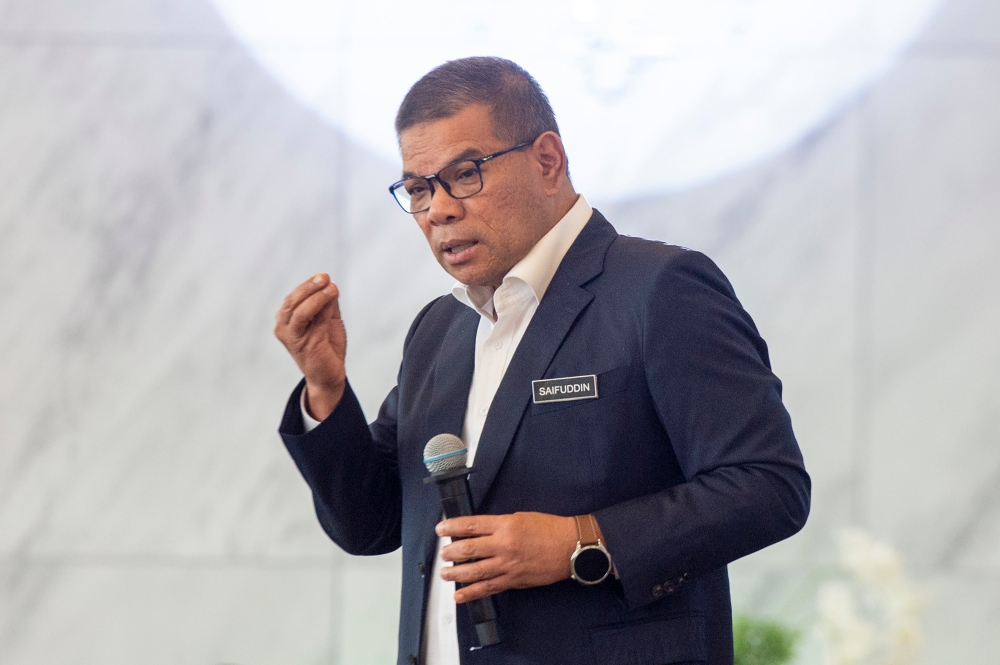 Home Minister Datuk Seri Saifuddin Nasution Ismail delivering his speech during the breaking of fast with the ministry’s department and media agencies at Boraombak, Putrajaya, March 25, 2024. — Picture by Shafwan Zaidon