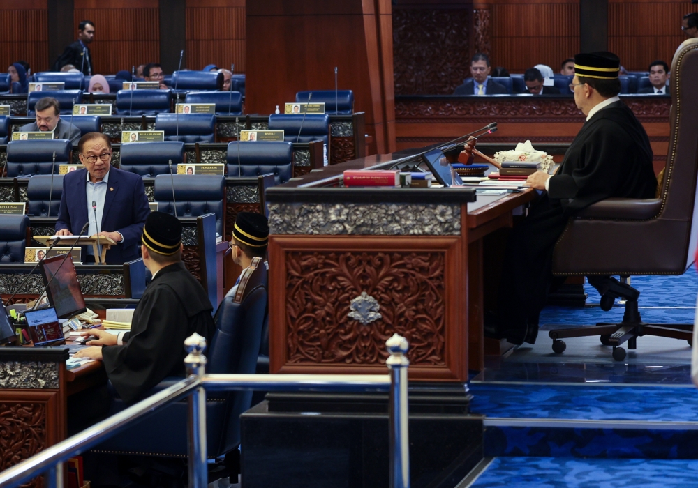 Prime Minister Datuk Seri Anwar Ibrahim speaks at the Parliament in Kuala Lumpur March 26, 2024. — Bernama pic