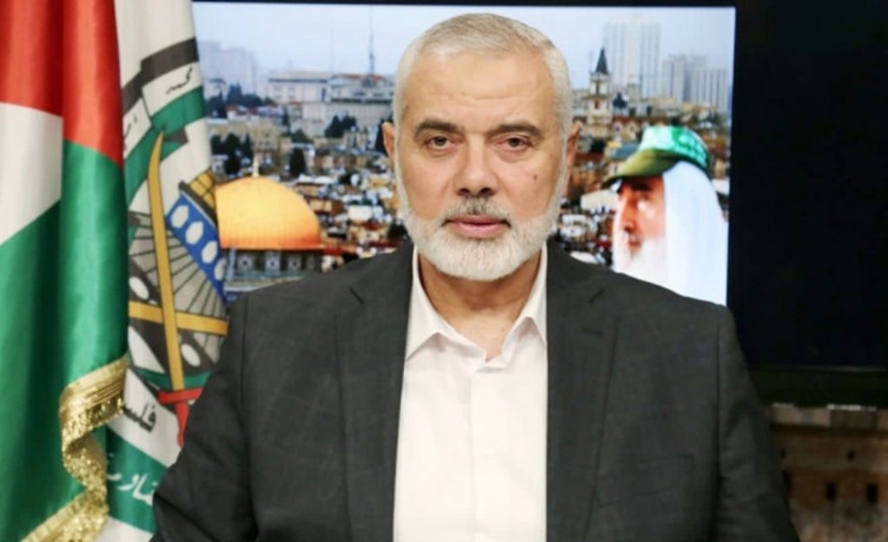 Chairman of the Political Bureau of the Palestinian Hamas movement Ismail Haniyeh speaks during a video statement marking the 34th anniversary of the founding of the Hamas movement, December 14, 2021, Qatar, Doha. — Hamas Chief Office via APA Images via ZUMA Press Wire/dpa