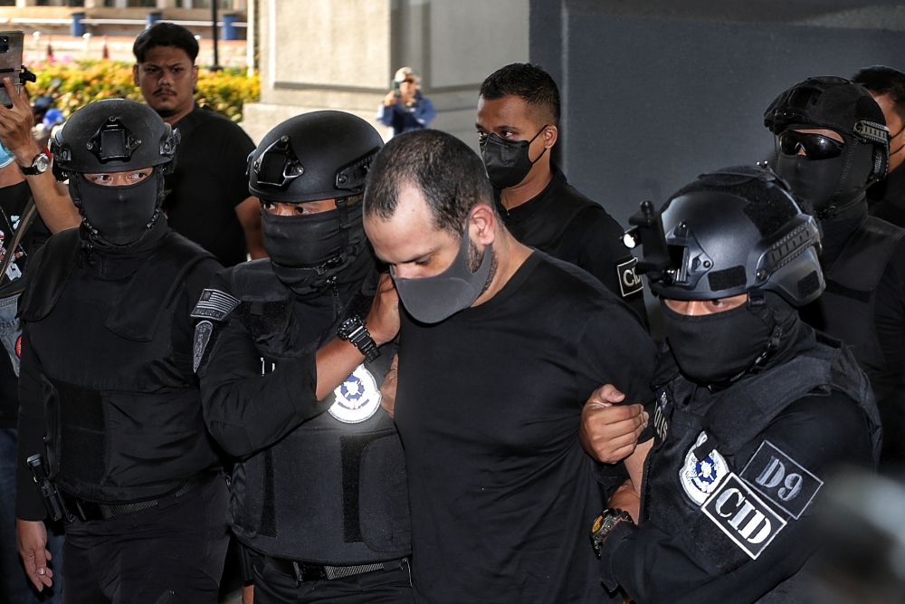 Israeli national Shalom Avitan was charged with trafficking six firearms and possessing four boxes of ammunition without an arms licence at a five-star hotel room between March 26 and March 28. — Picture by Choo Choy May 