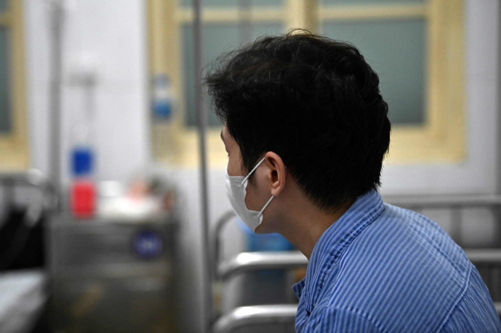 This picture taken on April 2, 2024 shows a drug-resistant tuberculosis patient at a treatment room at National Lung Hospital in Hanoi. — AFP pic