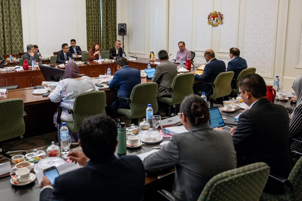 Prime Minister Datuk Seri Anwar Ibrahim is seen chairing the National Investment Council (NIC) Meeting. — Picture via Facebook/Anwar Ibrahim