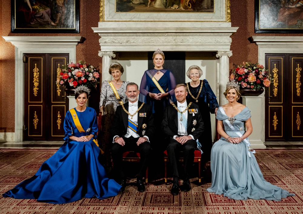 (From top left) Dutch Princess Margriet, Dutch Crown Princess Amalia, Dutch Princess Beatrix (from bottom left) Spanish Queen Letizia, Spanish King Felipe, Dutch King Willem-Alexander and Dutch Queen Maxima during the official photo prior to the state banquet with at the Royal Palace in Amsterdam as part of a two-days visit of the Spanish royal couple in the Netherlands. — AFP pic