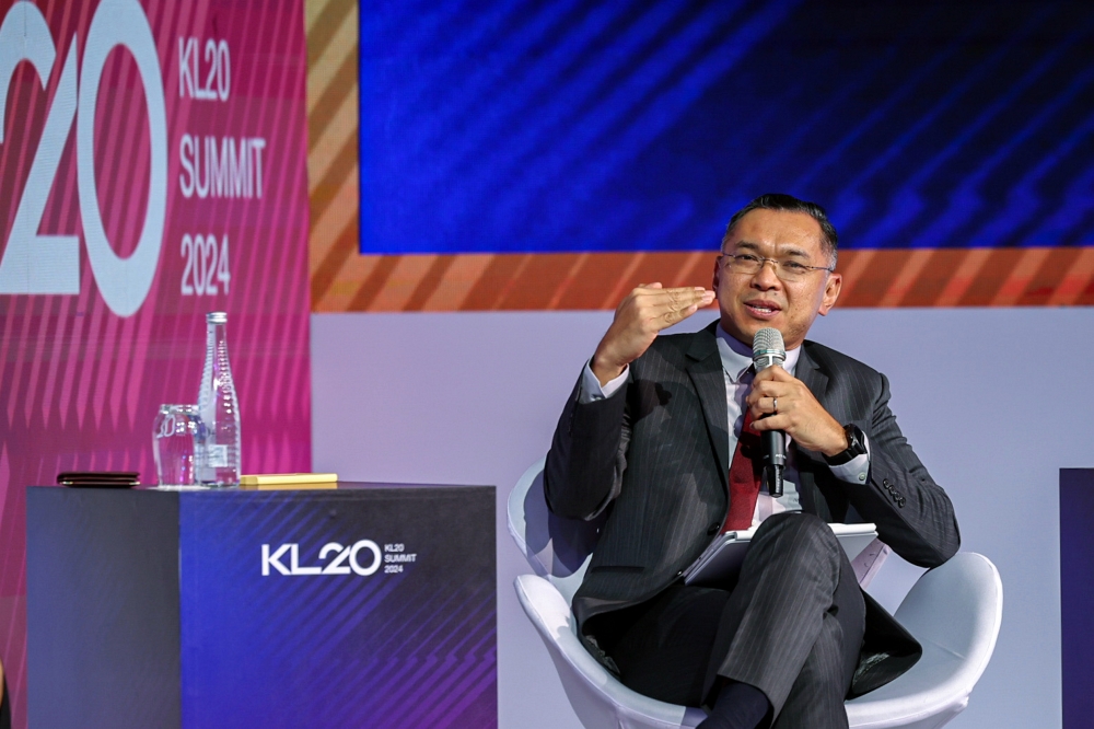 MDEC chief executive officer Mahadhir Aziz speaks at a panel session titled ‘The Evolution of Smart Cities’ during the KL20 Summit 2024 at the Kuala Lumpur Convention Centre, April 22, 2024. — Bernama pic 