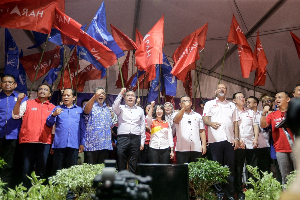 Unity government candidate Pang Sock Tao in a group photo with the unity government leadership during the announcement of her candidacy for the Kuala Kubu Baru by-election at the DAP operations centre, Kuala Kubu Baru, April 24, 2024. — Picture by Sayuti Zainudin