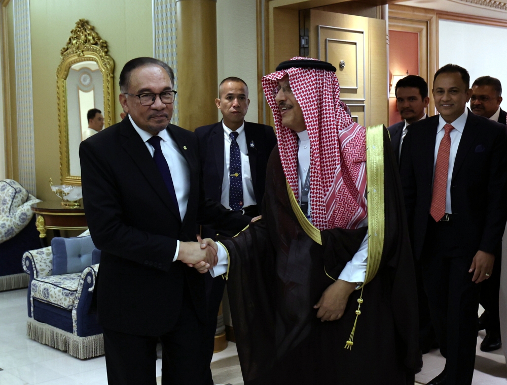 Prime Minister Datuk Seri Anwar Ibrahim shakes hands with Acwa Power chairman Mohammad A. Abunayyan on the sidelines of the World Economic Forum Special Meeting in Riyadh April 29, 2024. — Bernama pic