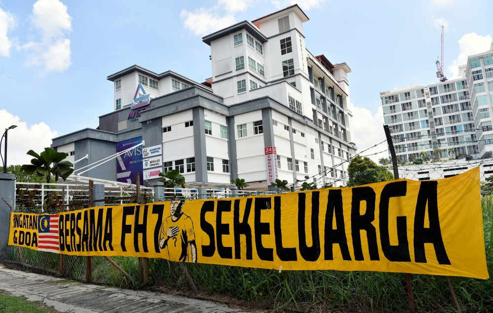 A banner supporting national footballer Muhammad Faisal Abdul Halim is seen outside a private hospital at Section 14 Shah Alam May 11, 2024. On May 5, Faisal Halim suffered fourth-degree burns after being splashed with acid at a shopping mall in Petaling Jaya. — Bernama pic