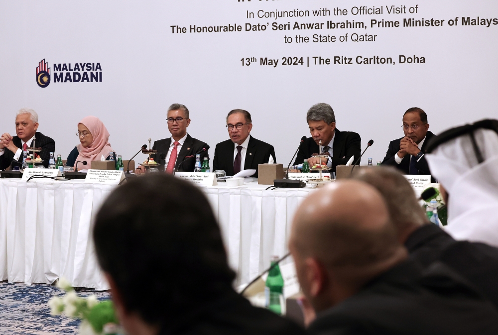 Prime Minister Datuk Seri Anwar Ibrahim (third from right) delivers his keynote address during a Round Table Meeting with the captain of industries in Doha May 13, 2024. — Bernama pic