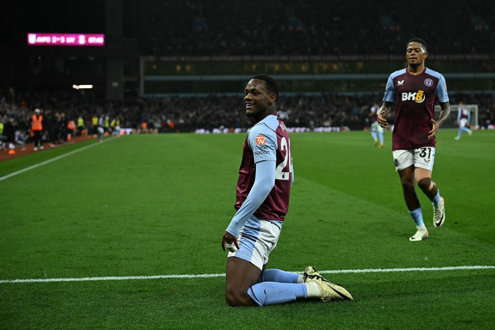 Aston Villa’s Columbian striker Jhon Duran (left) celebrates scoring the team’s third goal during the English Premier League football match between Aston Villa and Liverpool at Villa Park in Birmingham May 13, 2024. — AFP pic