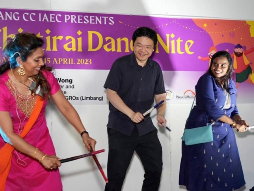 Lawrence Wong taking part in Tamil New Year celebrations with Prema Suresh (right) in Limbang, April 15, 2023. — TODAY pic