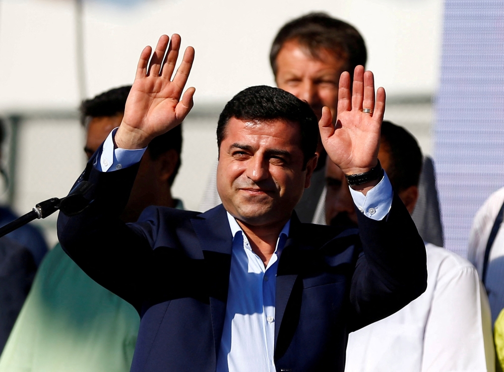 Selahattin Demirtas, co-leader of the pro-Kurdish Peoples' Democratic Party (HDP), greets the crowd during a peace rally to protest against Turkish military operations in northern Syria, in Istanbul, Turkey, September 4, 2016. — Reuters file pic