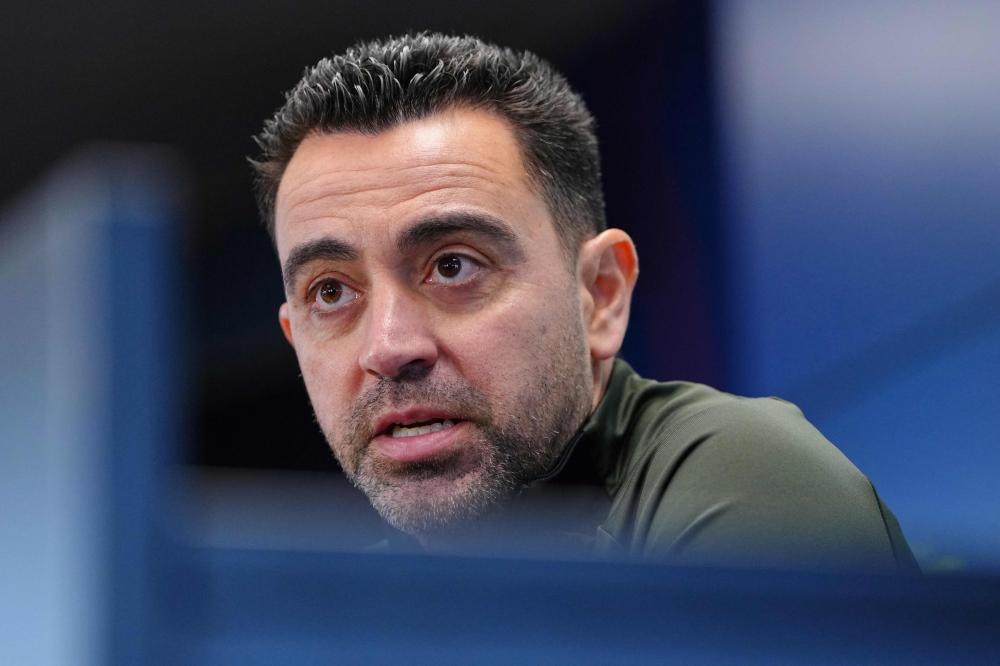 Barcelona host lowly Rayo Vallecano on Sunday with heavy focus on coach Xavi Hernandez. — AFP pic