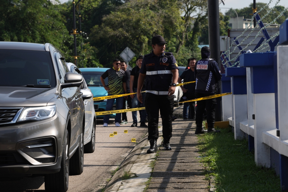 Forensic police examine the scene of the attack at the Ulu Tiram police station, Johor Baru, May 17, 2024. ― Bernama pic