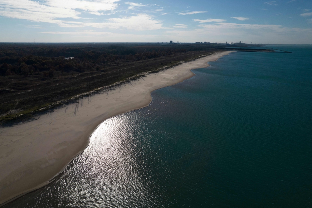 This aerial photo shows Indiana Dunes National Park and Lake Michigan near Porter, Indiana, on November 2, 2023. — AFP pic