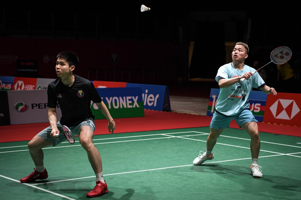 National men’s doubles shuttlers Aaron Chia-Soh Wooi Yik during official training at Axiata Arena, May 20, 2024. — Bernama pic   