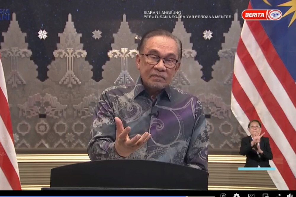 During a live address to the nation tonight, Prime Minister Datuk Seri Anwar Ibrahim said he emphasised the corruption issue because it is the primary cancer that weakens the country’s economy, eroding morals and diminishing people’s confidence. — Screengrab from Facebook/Anwar Ibrahim 