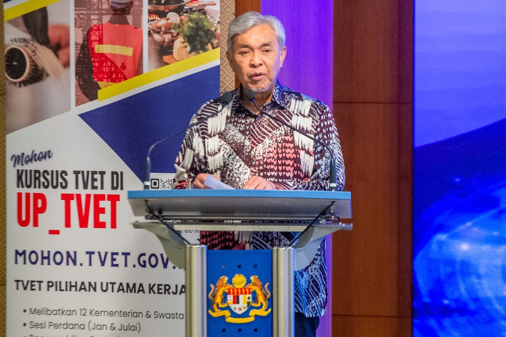 Deputy Prime Minister Datuk Seri Ahmad Zahid Hamidi delivers his speech during the launch of UPTVET system in Putrajaya May 20, 2024. — Picture by Shafwan Zaidon