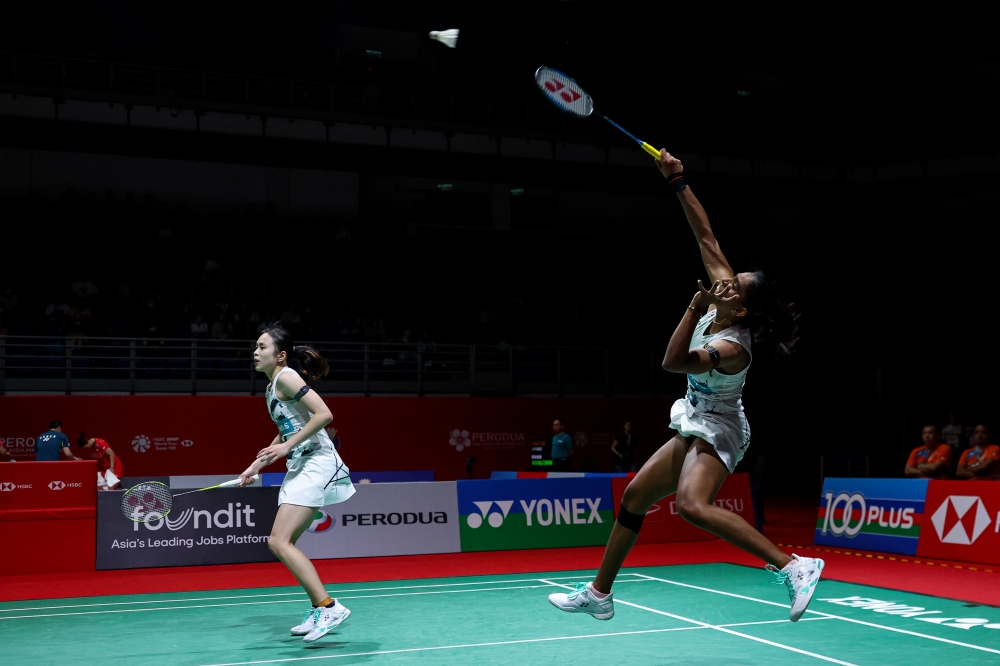 Top national women’s doubles pair Pearly Tan-M. Thinaah in action against India's Simran SInghi and Ritika Thaker in Bukit Jalil today. — Bernama pic