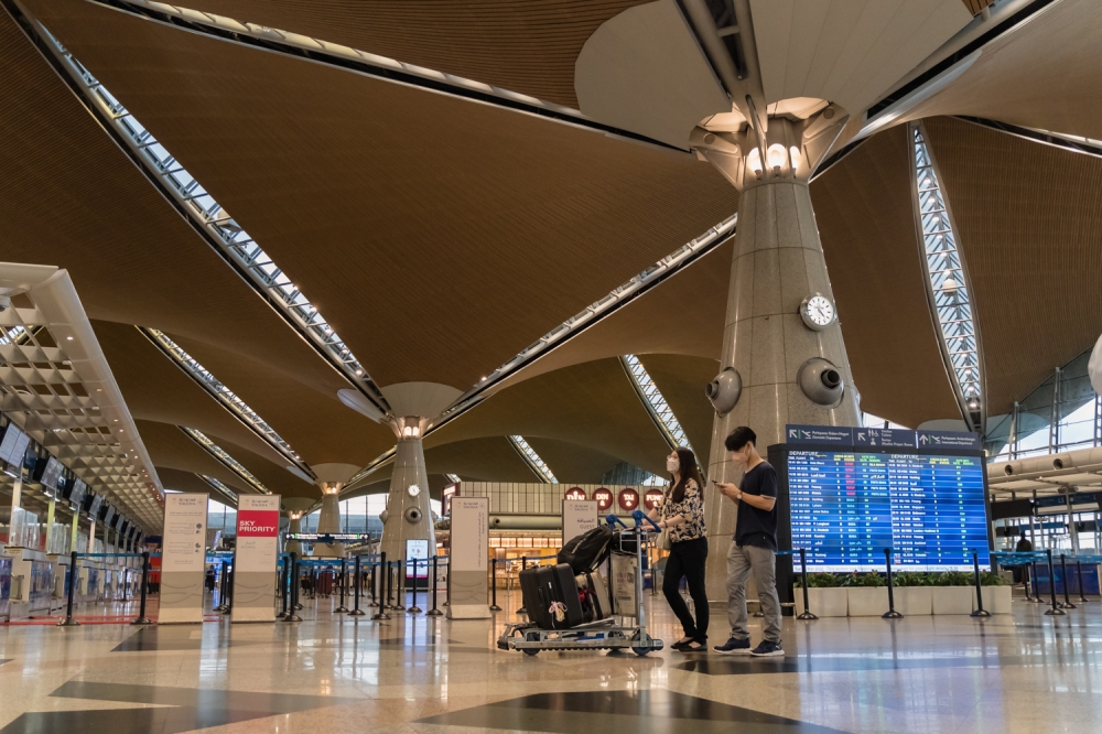 Some economists suggested privatisation could bolster Malaysian airports’ competitiveness after lagging behind their regional competitors for so long. Opposition lawmakers, however, were more critical although not necessarily about the privatisation proposal itself. — Picture by Devan Manuel