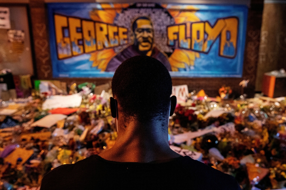 File photo of a man reciting spoken word poetry at a makeshift memorial honouring George Floyd, at the spot where he was taken into custody, in Minneapolis, Minnesota, June 1, 2020. — Reuters pic