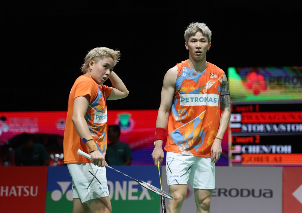 Chen Tang Jie-Toh Ee Wei during their match against fellow national shuttlers Goh Soon Huat and Lai Shevon Jemie at the Malaysia Masters yesterday. — Bernama pic