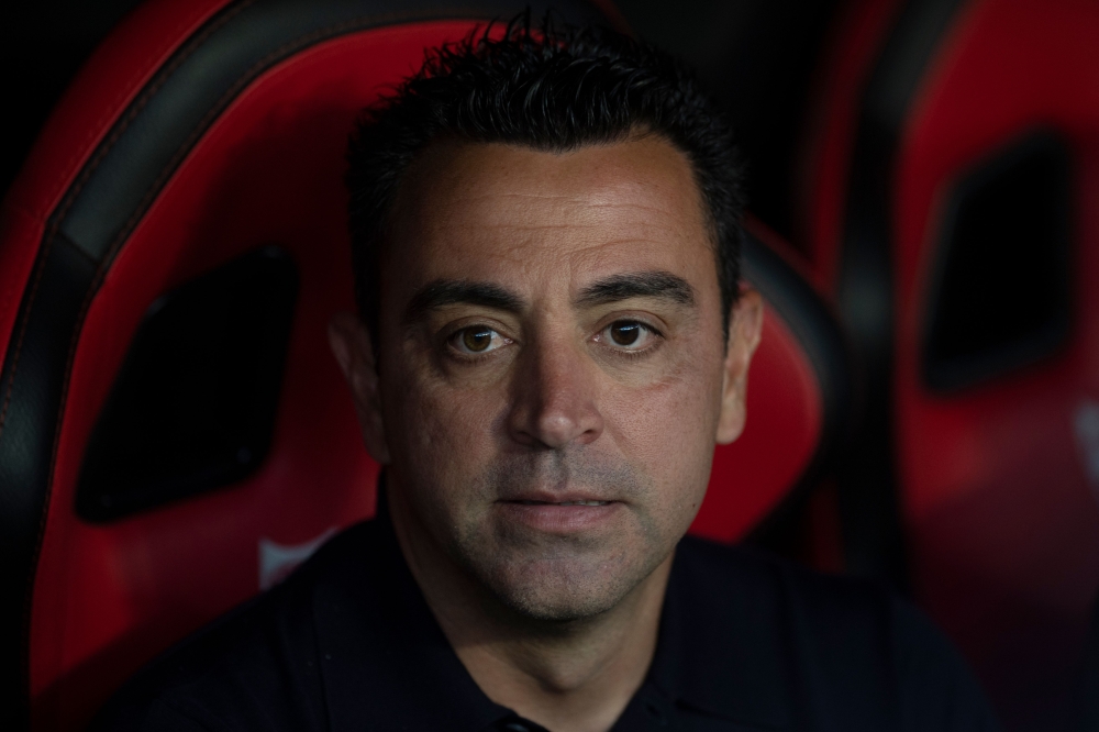 Barcelona's Spanish coach Xavi Hernandez is pictured prior to the Spanish league football match between Sevilla FC and FC Barcelona at the Ramon Sanchez Pizjuan stadium in Seville May 26, 2024. — AFP pic