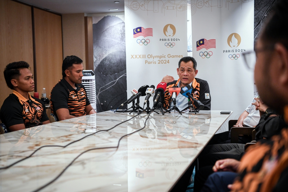 Malaysian chef de mission for the Paris Olympics Datuk Hamidin Mohd Amin speaks at a press conference after a gathering with athletes in Petaling Jaya, May 27, 2024. — Bernama pic 