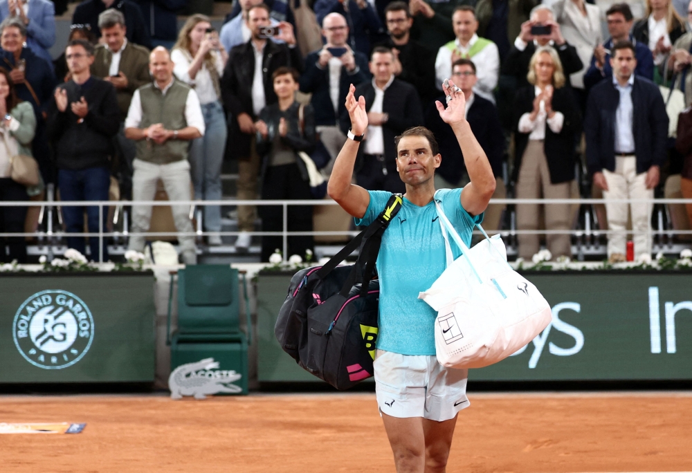 Rafael Nadal waves to the crowd as he leaves the court after losing his first round match against Germany’s Alexander Zverev in Paris May 27, 2024. — Reuters pic