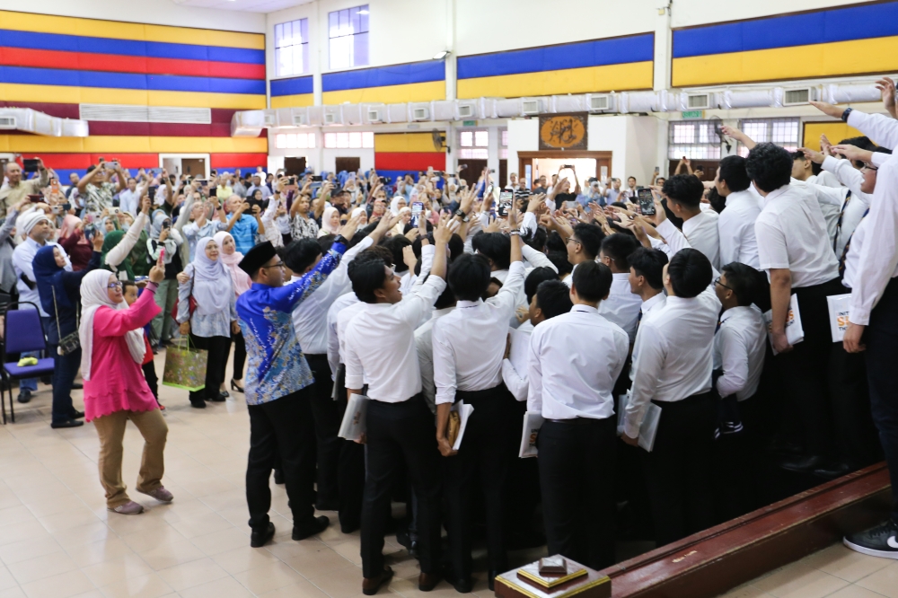Students celebrating after receiving their SPM results at Sekolah Sultan Alam Shah on May 27, 2024. ― Picture by Miera Zulyana